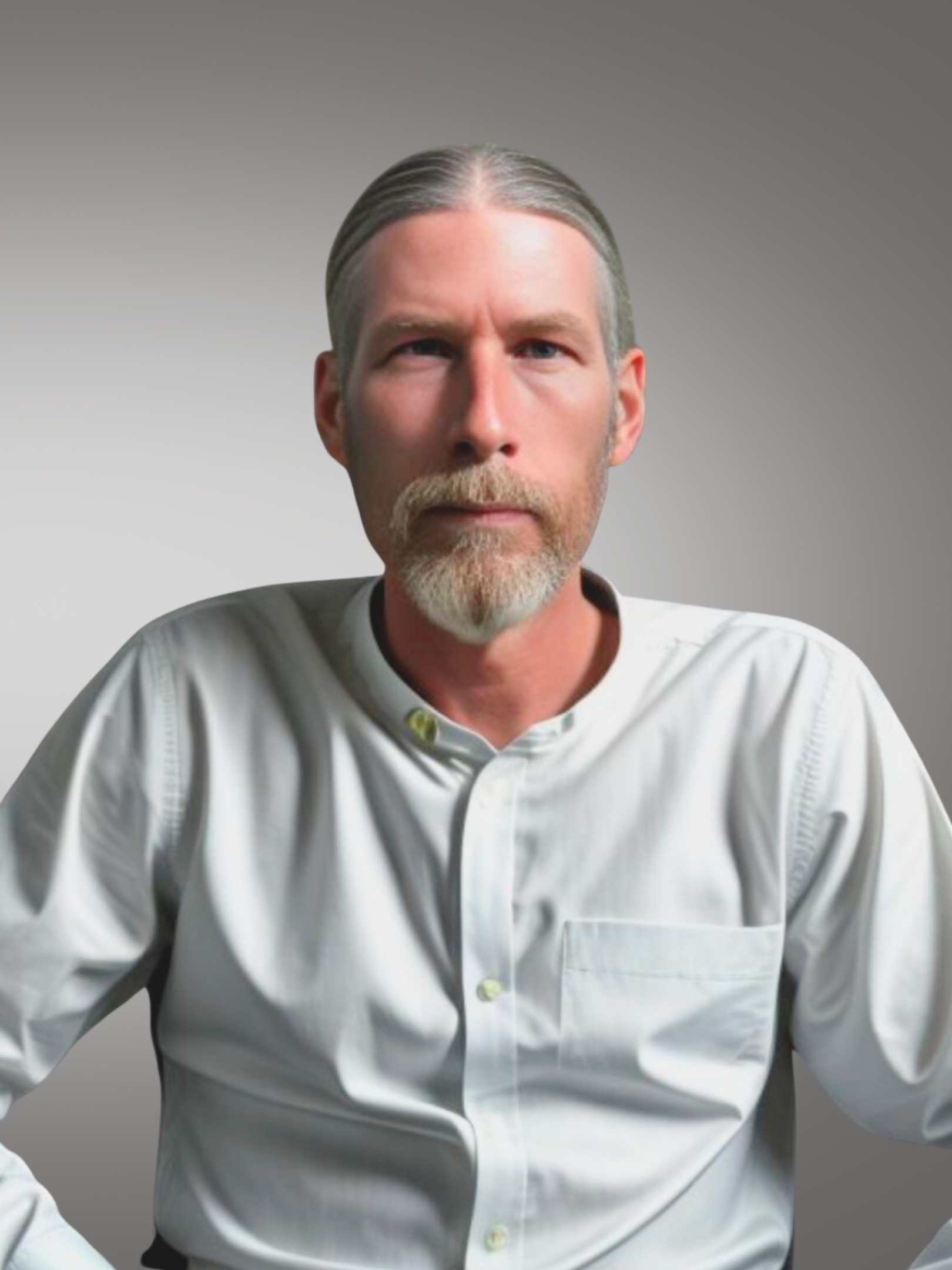 A man with long hair and beard wearing a white shirt.