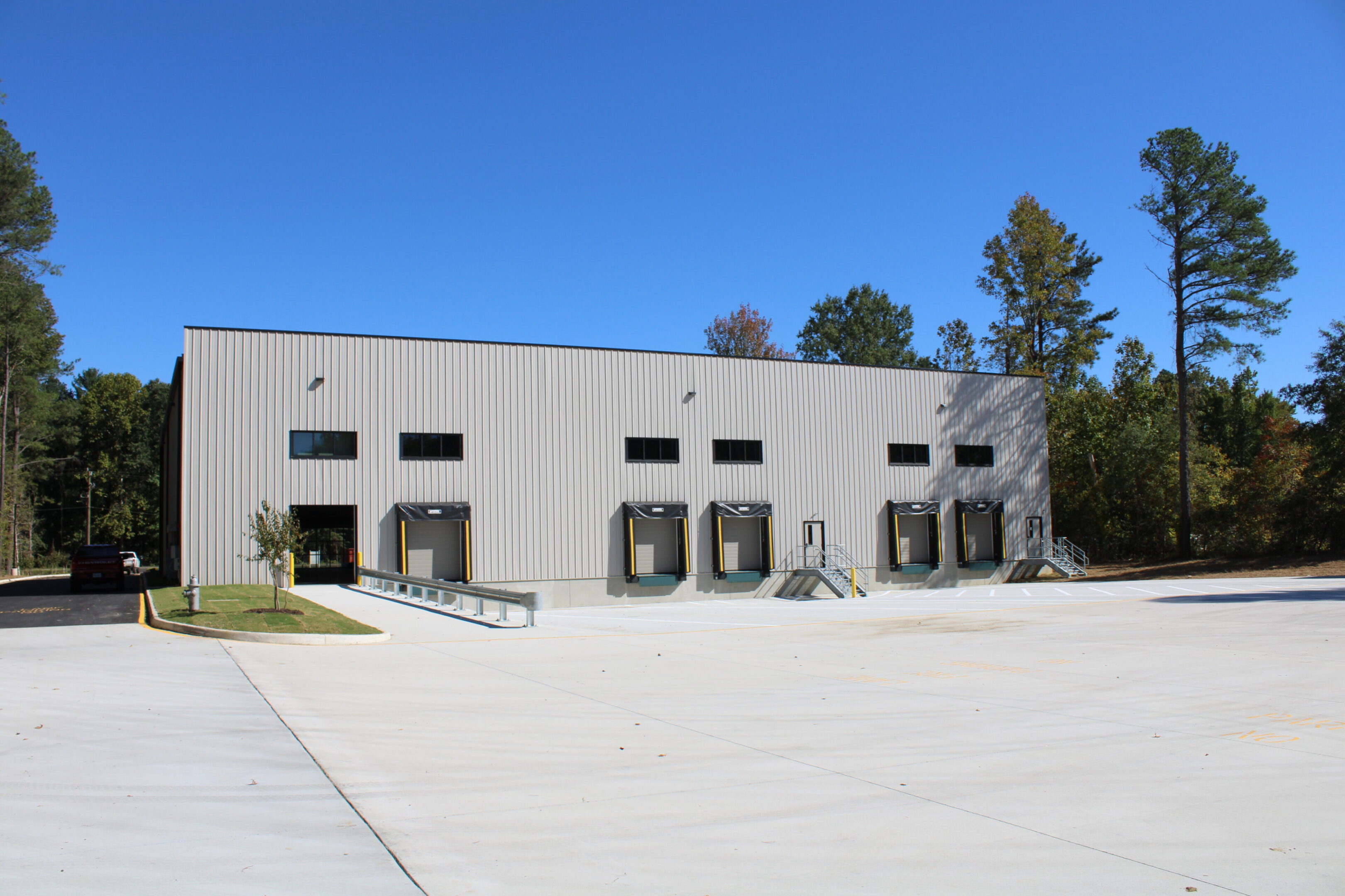 A large building with many windows and doors.