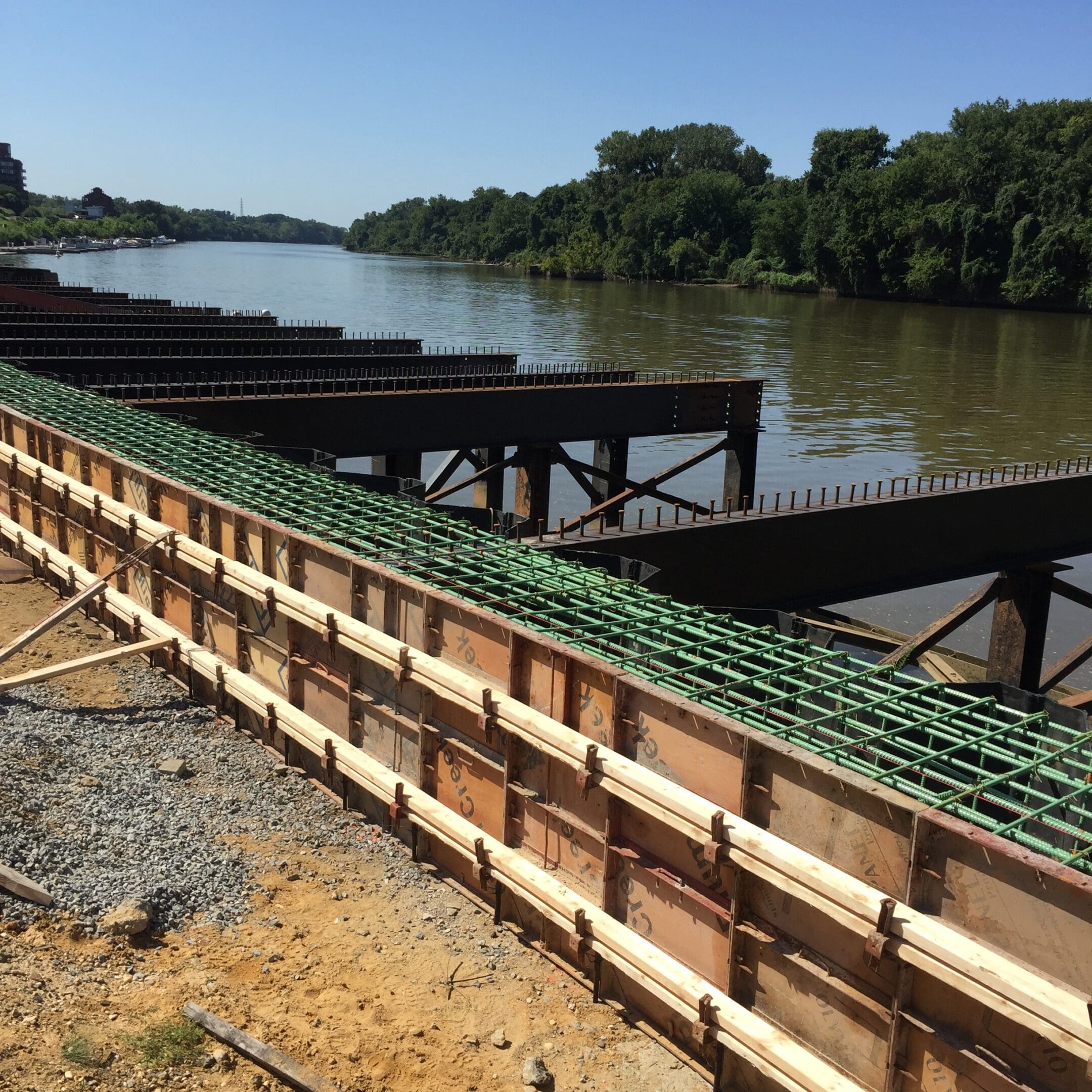 A bridge that is being built over water.