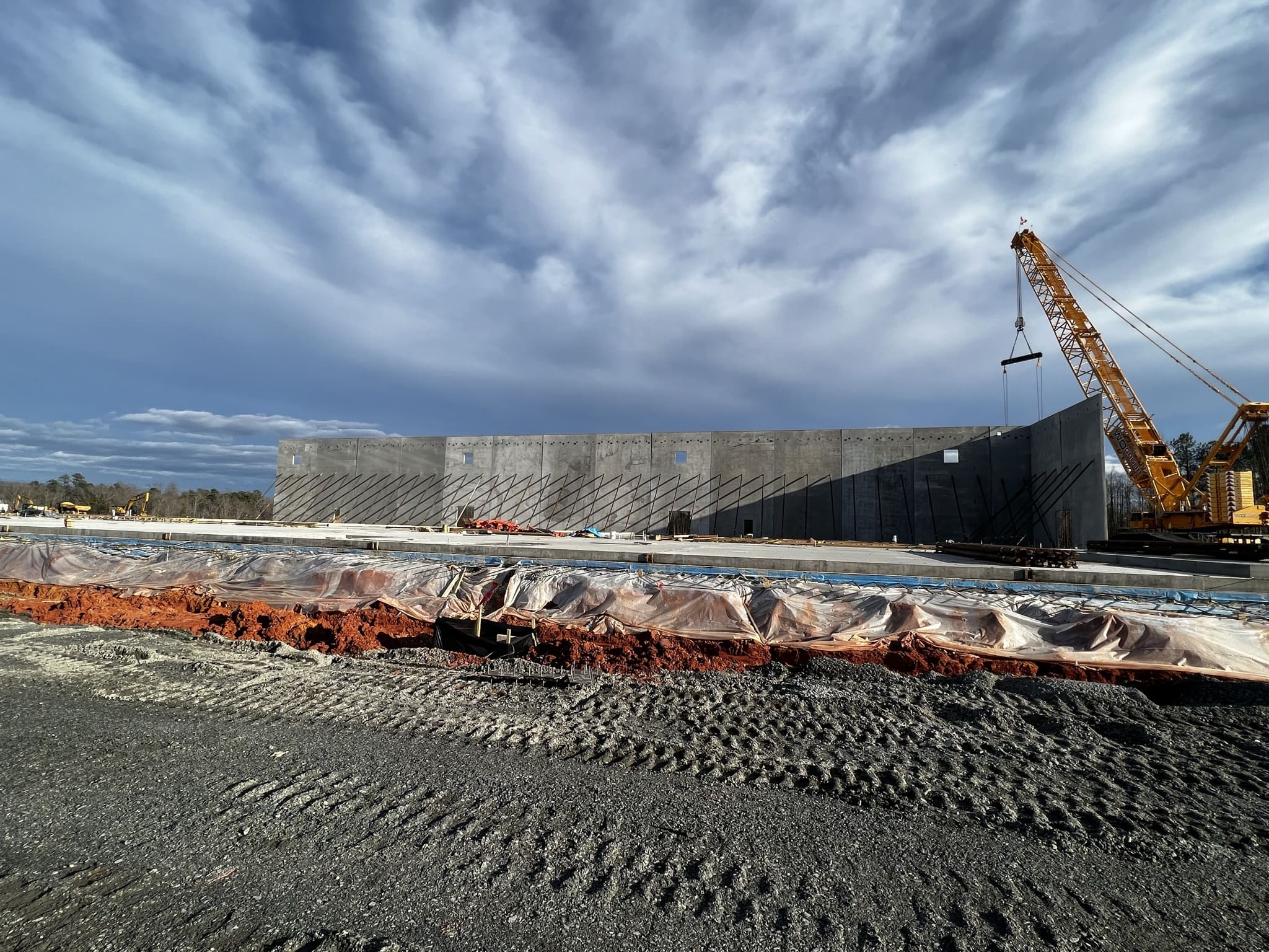 A construction site with some large concrete blocks.